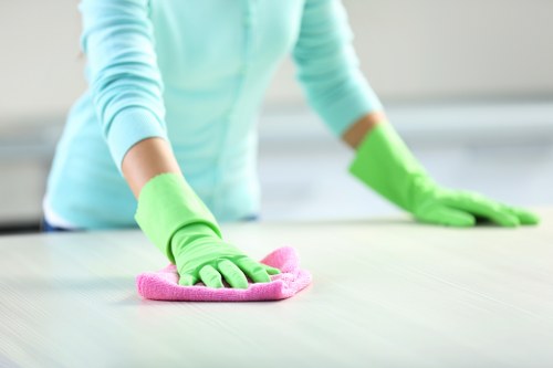 Technician wearing PPE during carpet cleaning