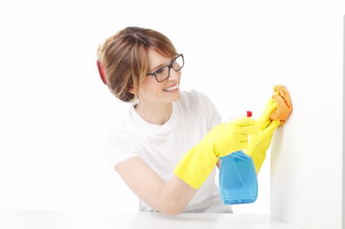 Cleaner preparing a Clapham property for final inspection