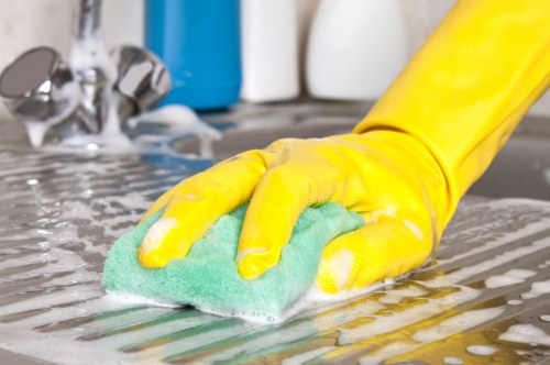 Clapham cleaner preparing a spotless kitchen and living area